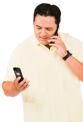 Mid adult man using phone