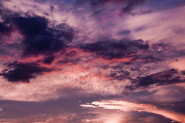 Naklejka na ściany i meble Beautiful purple sunset after a thunder storm