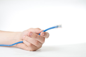 Hand holding internet cable