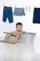 little boy in wash tub