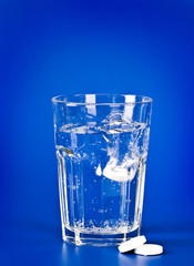 aspirin and glass of water
