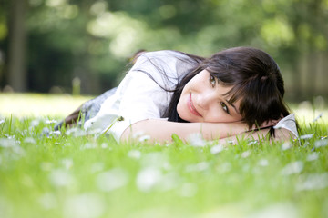 woman lying on grass