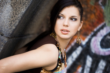 girl near the wall with graffiti