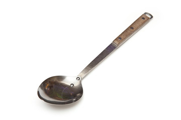 Serving spoon isolated on a white studio background.