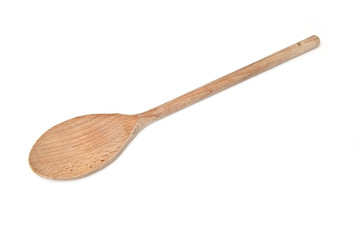 Wooden spoon isolated on a white studio background.