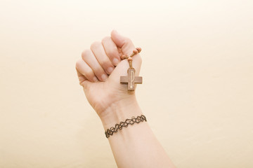 hand with cross