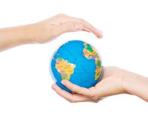 Hands holding and protecting earth, isolated on white