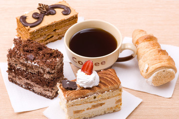 Fototapeta na wymiar cakes with cup of coffee