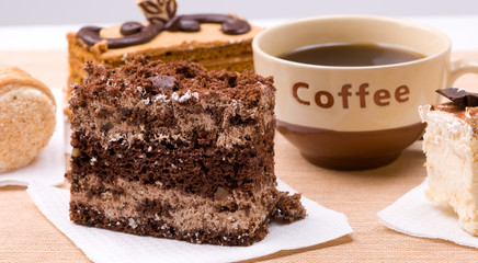Biscuit cakes with cup of coffee