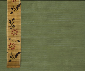 flower bamboo banner on olive ribbed wood background