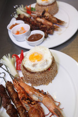 Fried rice eastern cuisine with sate and seafood