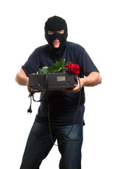 Happy robber come to his girlfriend with a gift