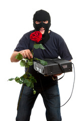 Happy robber come to his girlfriend with a gift