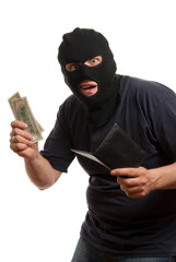 Surprised robber takes money from stolen wallet.