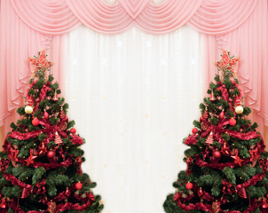 Two Christmas tree and curtains