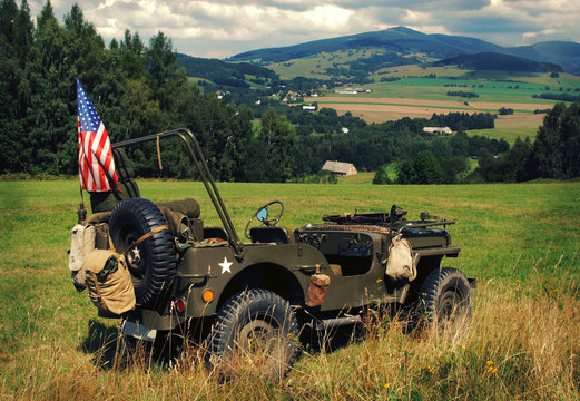 Old Fighting Jeep Willys In Terrain Of Czech Mountains