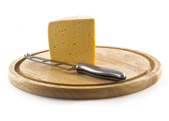 Knife and cheese on the board