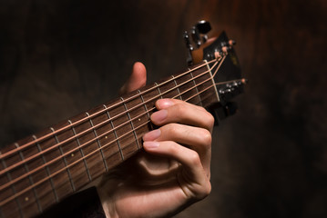 Obraz na płótnie Canvas Ręka z gitarą