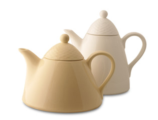 Two perfect teapots composition isolated