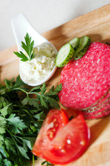 Salami slices with different vegetables