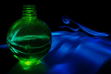 Green sphere with blue smoke