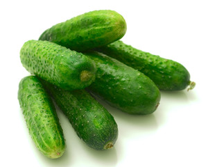 Cucumbers on a white