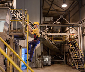 Naklejka premium Female factory worker