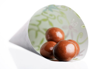 chocolate almonds in the paper bag