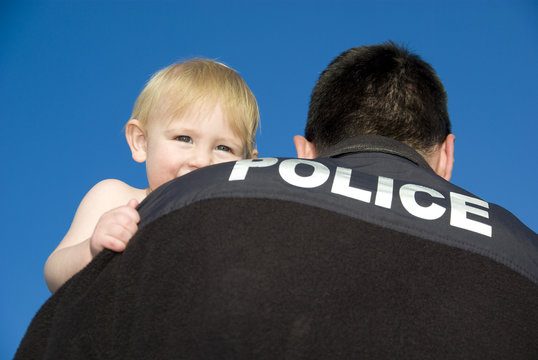 Police Officer Holds baby