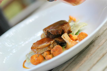 Fleisch mit Pilzen