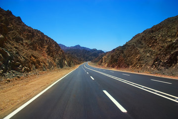 Empty road in rocky desert