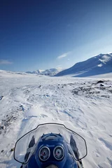 Fototapeten Schneemobil Winterlandschaft © Tyler Olson