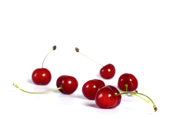 Naklejka na ściany i meble red cherries isolated on white
