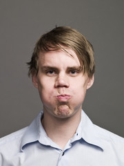 Obraz premium Portrait of a man making a funny face