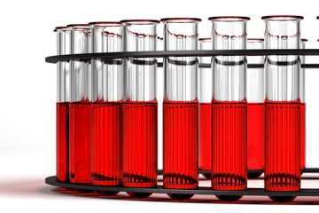 Test tubes with red liquid on white background with DOF effect