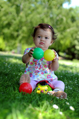 Baby girl in park