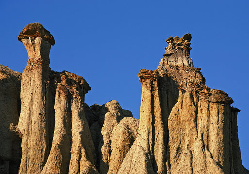 Rocky hill "Kuklica -Stone dolls" with blue sky in Macedonia