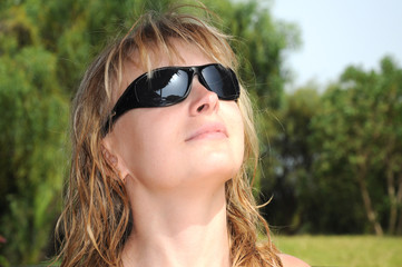 blonde girl looking to the sun 2