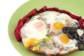 fried eggs and red eggplant