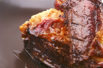 juice roast rib's close up over white