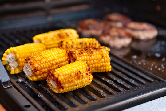 Sweetcorn cooking on a barbecue