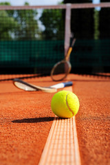 tennis ball, racket and net