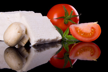 White feta cheese with tomato and mushrooms