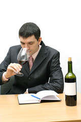 young man testing a wine