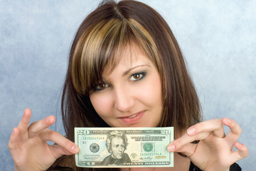 Young woman with dollar