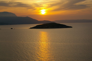 Fototapeta na wymiar Sunset over Souda Bay, Crete, Greece