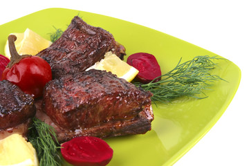 ribs on green dish