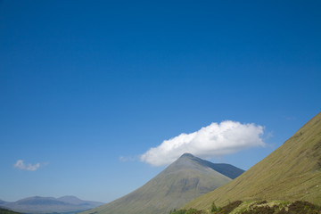 Mountain Beinn Dorain, Scotland, Highlands, with a blud over it
