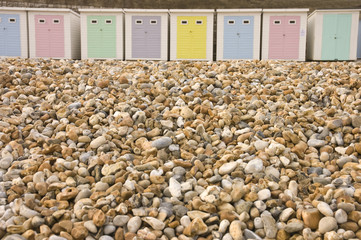 interesting juxtaposition of bech huts to the gravel on the beac