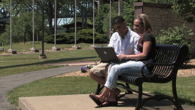 Couple Uses Laptop